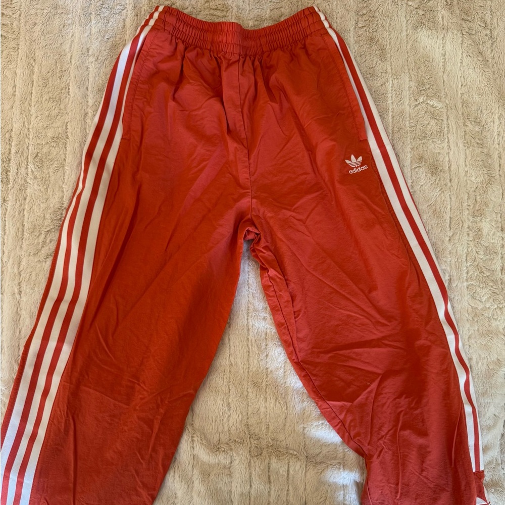 Adidas Red Pants with White Stripes
